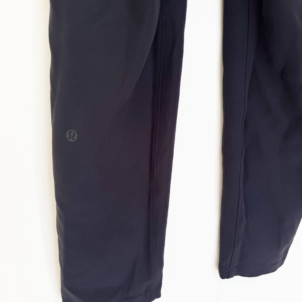 LULULEMON On the Fly 7/8 Pant Woven Black Size 4 LW5BPMS - Picture 7 of 10
